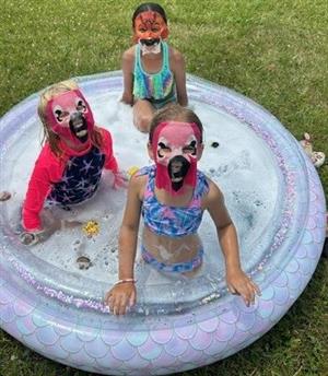 Our camper color coded their swimsuit with their flamengo face mask!