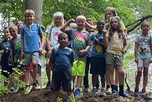 Our amateur archaeologists after finishing a dig!