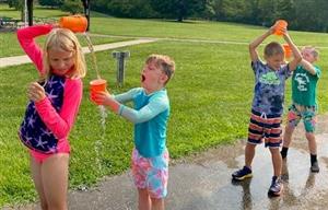 Trying to catch the water with the wrong container! 